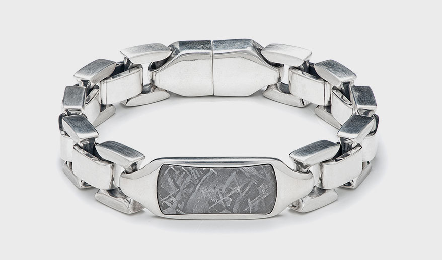 WiIliam Henry Meteorite Identity sterling silver bracelet with centerpiece inlaid with Gibeon meteorite and button lock with sapphire