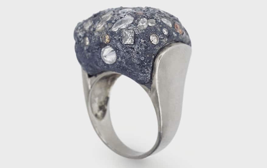  Miles McMeel Platinum ring with concrete and colored diamonds. 