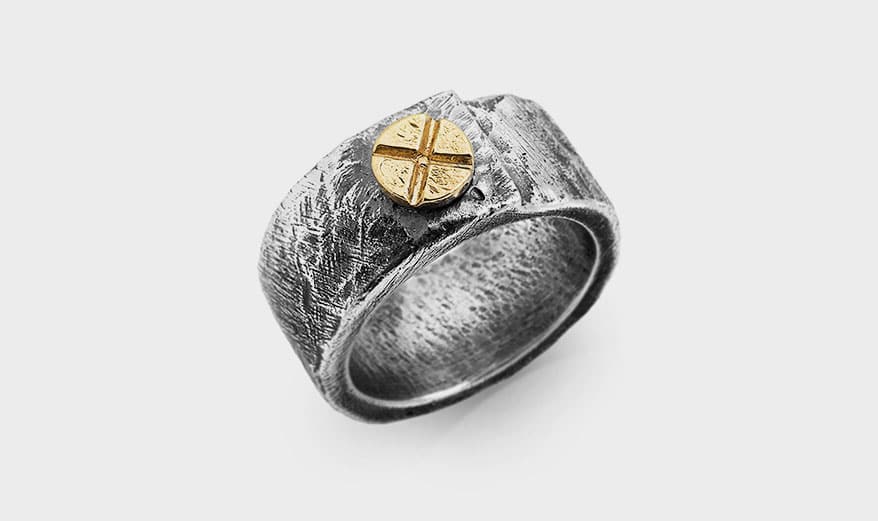 The Noo Studio Sterling silver ring with brass screw. 
