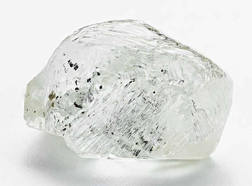 242.31-carat, gem-quality crystal in white background
