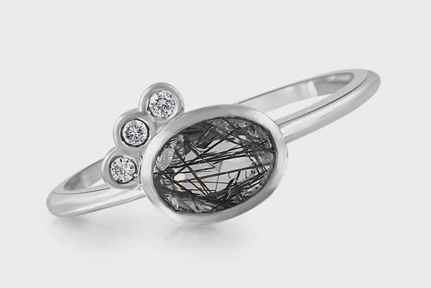 Amanda Lockrow  Sterling silver ring with tourmalinated quartz and diamonds.