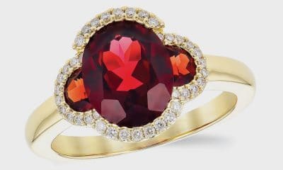 14K yellow gold ring featuring garnets with diamonds
