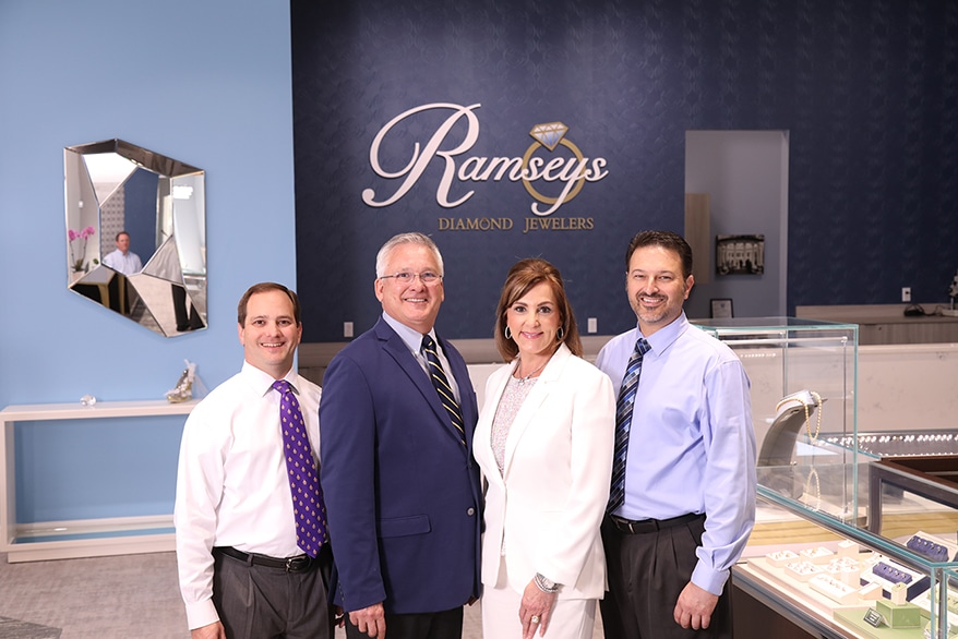 From left, Bobby, Robert and Lori Ramsey, and Sean Bradford, director of sales.