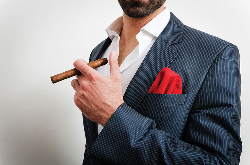 man-holding-cigar