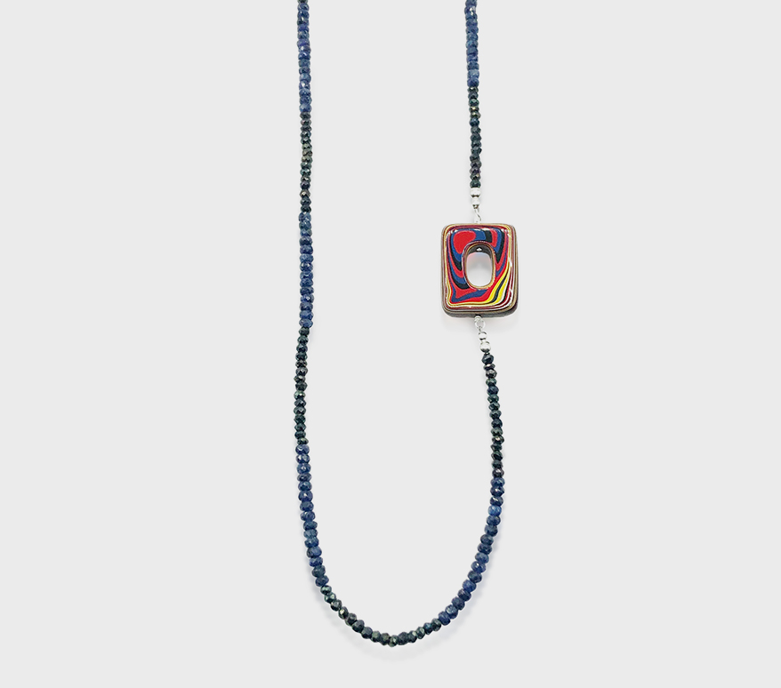 Chrissy Liu Jewelry Sterling silver necklace with sapphire, pyrite, and fordite.