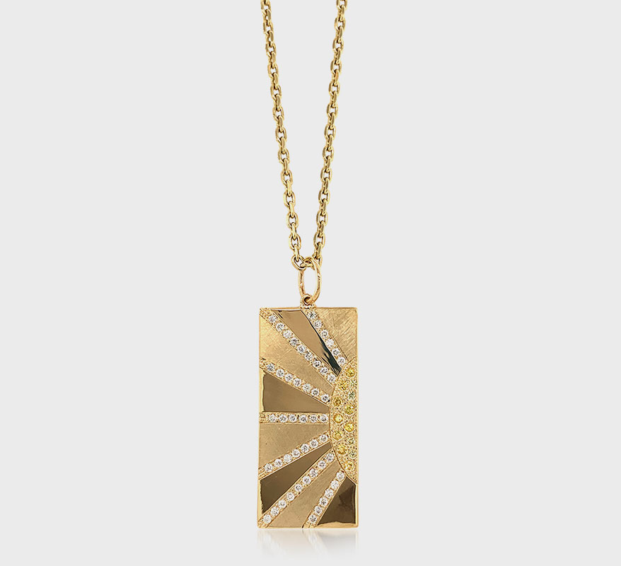 Julez Bryant 14K yellow gold pendant necklace with white sapphires and diamonds.
