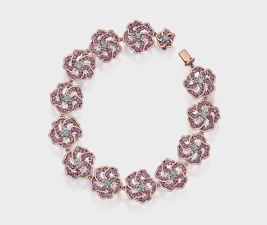 14K rose and white gold bracelet with pink sapphire and diamonds (0.76 TCW).