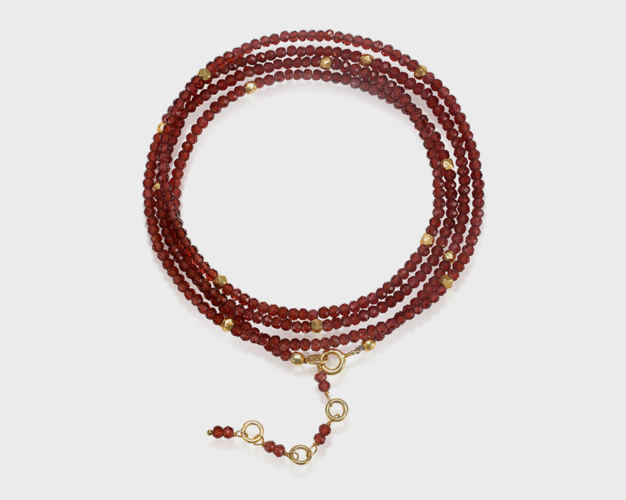 Amelia Rose Design  Bracelet with garnet beads and 14K yellow gold-plated sterling silver.