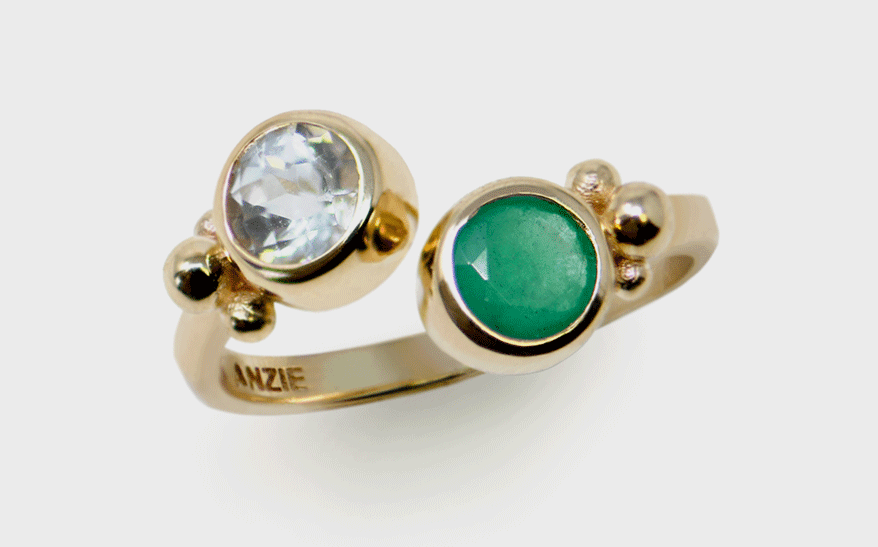 Anzie 14K yellow gold ring with emerald and topaz.