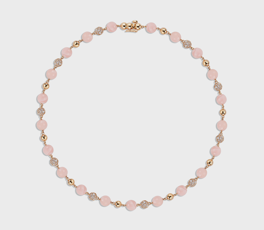 Akaila Reid 18K yellow gold necklace with pink opal and diamonds.