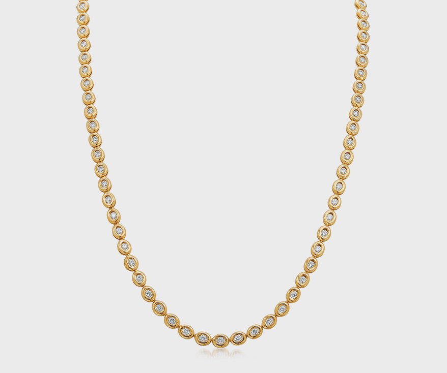 Gumuchian 18K yellow gold necklace with diamonds.