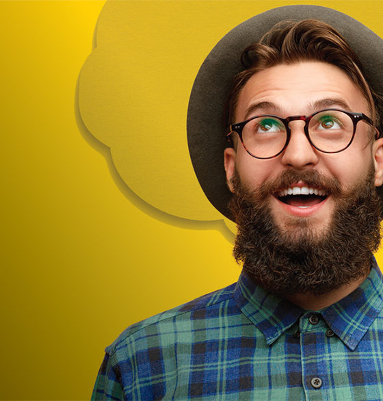 smiling-guy-in-yellow-background