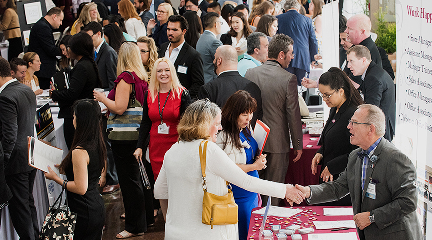 Recruiters and attendees connecting at the Career Fair – Powered by GIA in Carlsbad.