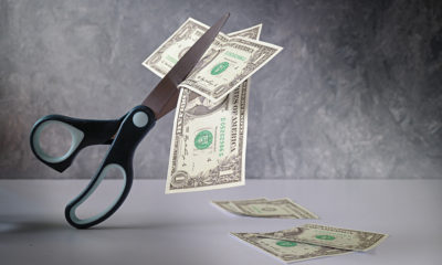 scissors-cutting-dollars