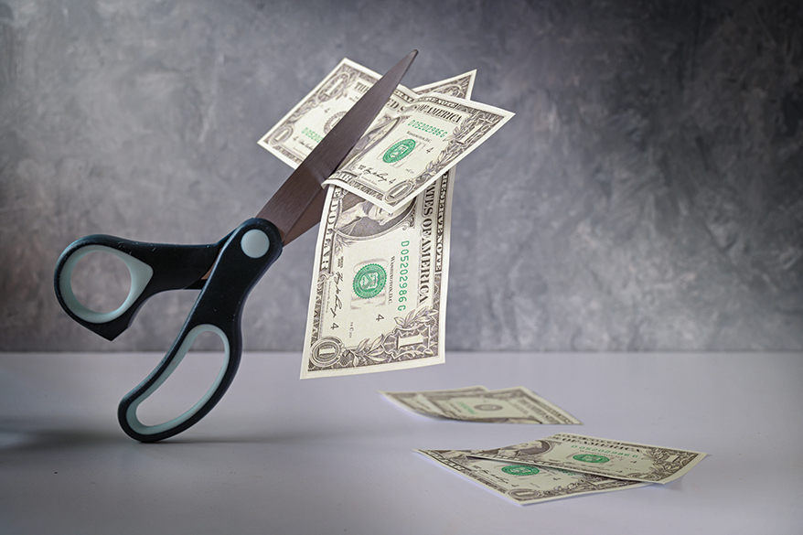 scissors-cutting-dollars