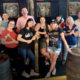 The Augusta team bonds on a Sunday with an axe-throwing activity.