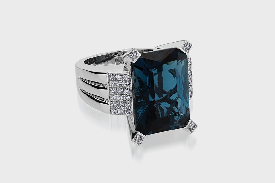 18K white gold ring with London Blue topaz and diamonds.