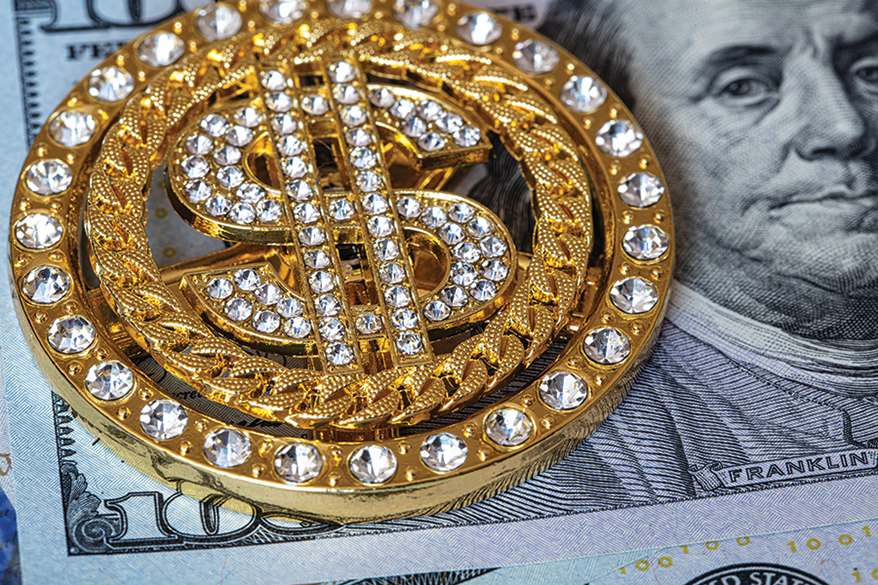 dollar-gold-jewelry-on-dollar-currency