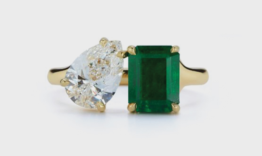 Jemma Wynne  18K gold bespoke emerald and diamond Kissing two-stone ring. 