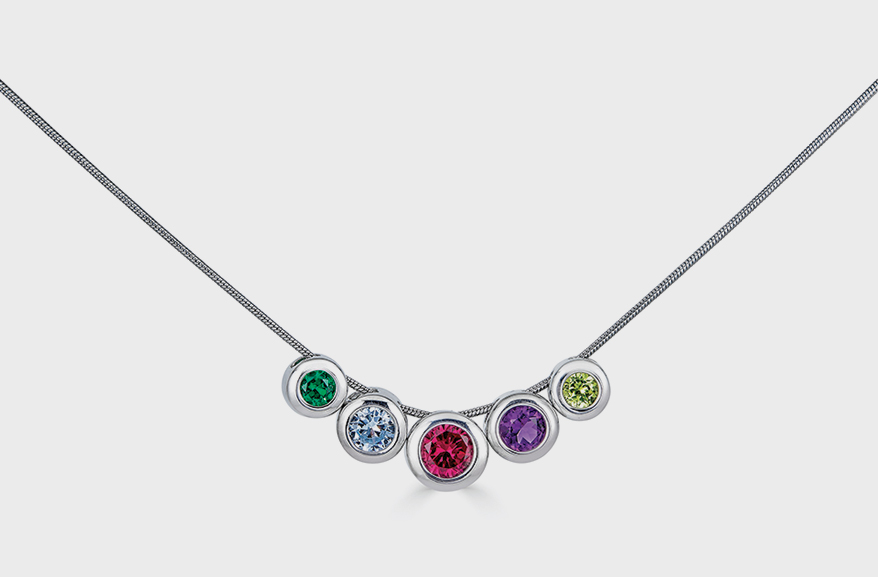 14K white gold necklace with 14K white gold sliders in created emerald, blue topaz, ruby, amethyst and peridot.