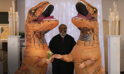 Dinosaur-Costumed Duo Say “I Do” at Albert’s Diamond Jewelers in Indiana