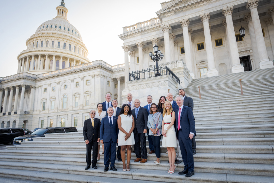 President and CEO Dave Bonaparte and JA members in front of the the U.S. Capitol. This year marks Jewelers of America ’ s 11 th Fly - In to Washington, D.C. Iowa Senator Joni Ernst met with the JA members for lunch on Wednesday. Pictured from L - R: Myriam Gumuchian, Tobey Ritchie, Joseph Molfese, Sen. Ernst, Bill Farmer Jr. and Olivier Stip. PHOTOGRAPHY: Copyright: Abby Greenawalt Photography