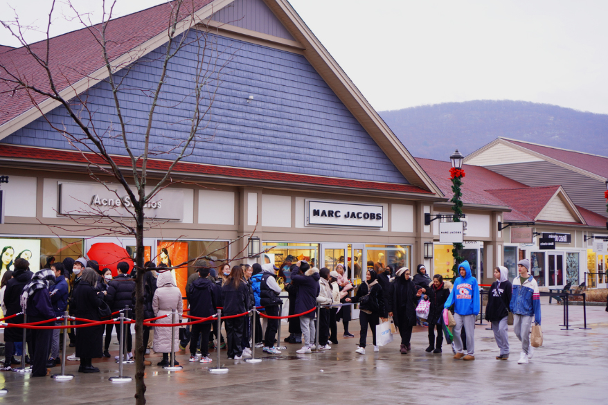 Shoppers lining up at a Black Friday sales event last year. PHOTOGRAPHY: Paul Zilvanus Lonan/iStock.com