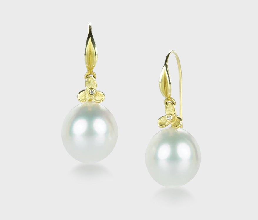 Barbara Heinrich 18K gold South Sea pearl drop earrings with diamond accented leaf tops.