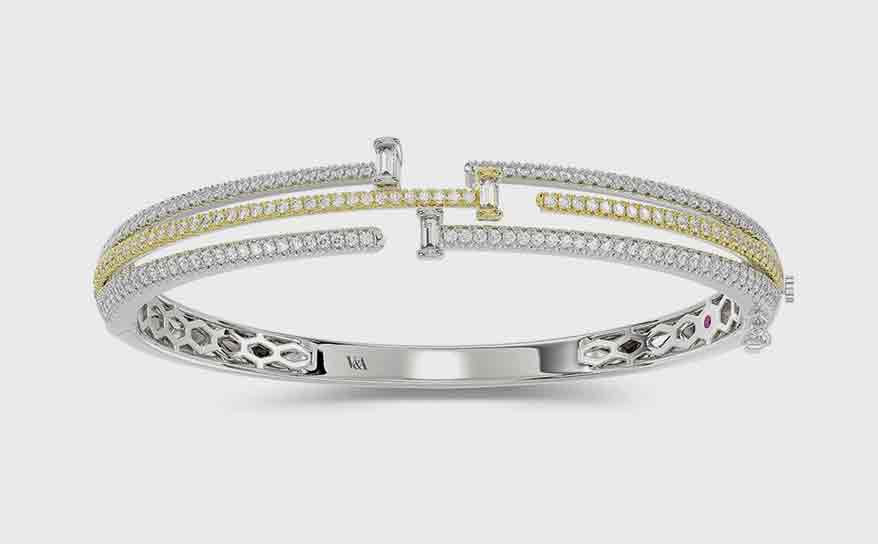 V&A LUXURY 14K white and yellow gold bangle with diamonds.
