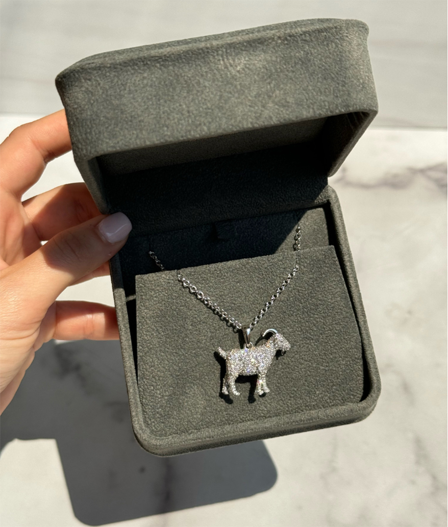 Judge the Jewels: GOAT Simone Biles Layers Her Olympic Gold With a Diamond Goat Necklace